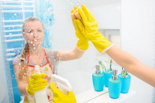 Local cleaner preparing a Bermondsey Airbnb for guest arrival